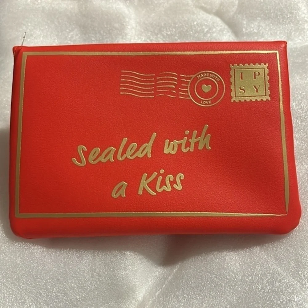 IPSy cosmetic red bag